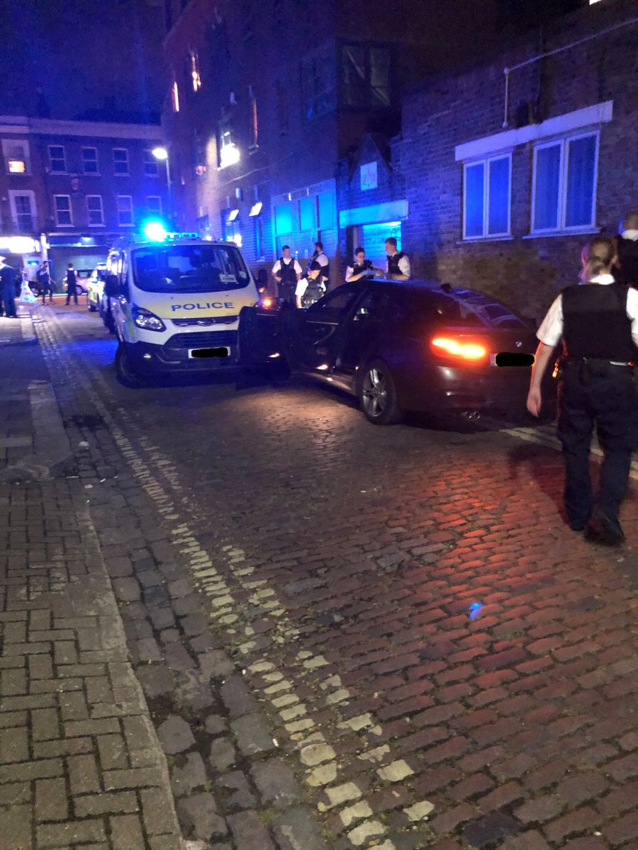 MPSCamden's tweet photo. Last night The Camden Night Time Economy Team responded to a call of people armed with swords. On searching for the vehicle concerned, this BMW decided to ram the police van to escape. A quantity of drugs found and 2 males were arrested and 1 officer sustained a broken hand. https://t.co/5gz2io4oS2