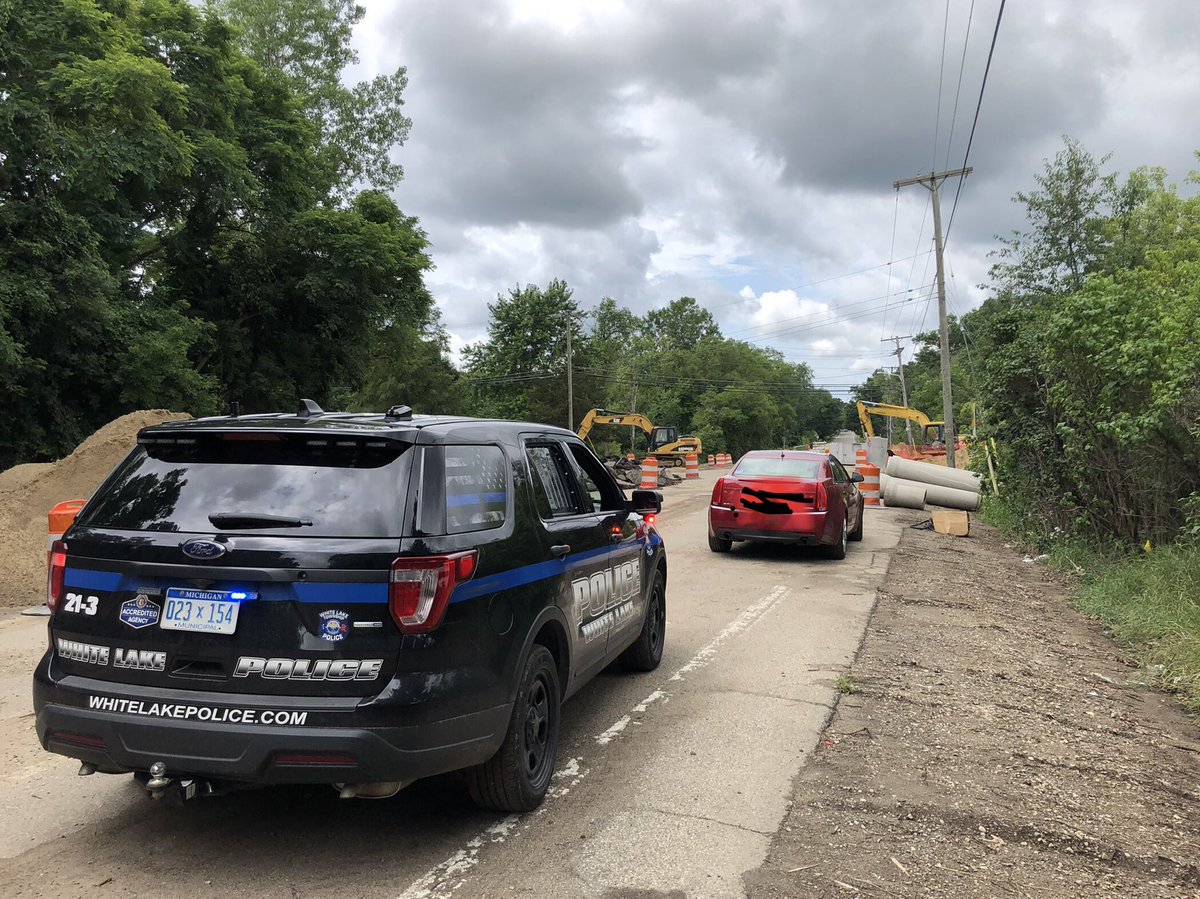 ATTENTION: If you go around 3 road closed barricades 🚧, around several piles of dirt / material, between the <a href="/oaklandroads/">Oakland County Roads, Michigan</a> construction vehicles 🚜, and up to the hole in the roadway, there is a strong possibility you will get a ticket 🎫 for disobeying a traffic control device.