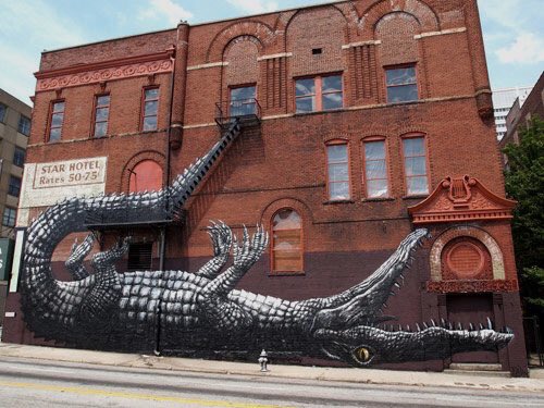 franch_laura's tweet photo. ROA es un artista urbano de Gante (Bélgica). Ha creado obras en muros y edificios de ciudades de Europa, Estados Unidos, Australia, Asia, Nueva Zelanda y África. Generalmente pinta animales silvestres o urbanos y aves que son nativas del área en la que está pintando. https://t.co/1FjiYi0YQV