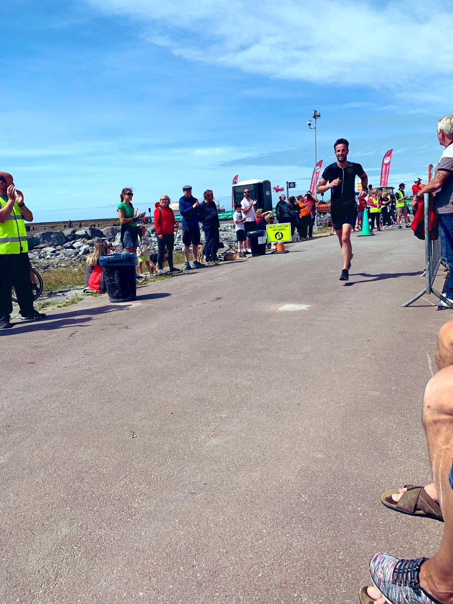 bethan2005's tweet photo. Fun day out watching @chrisorr8 complete his first triathlon with a smile on his face! Great event supporting the @BurryPortRNLI ! #runforestrun #Triathlon #teamorr https://t.co/sgr14vbV5Z