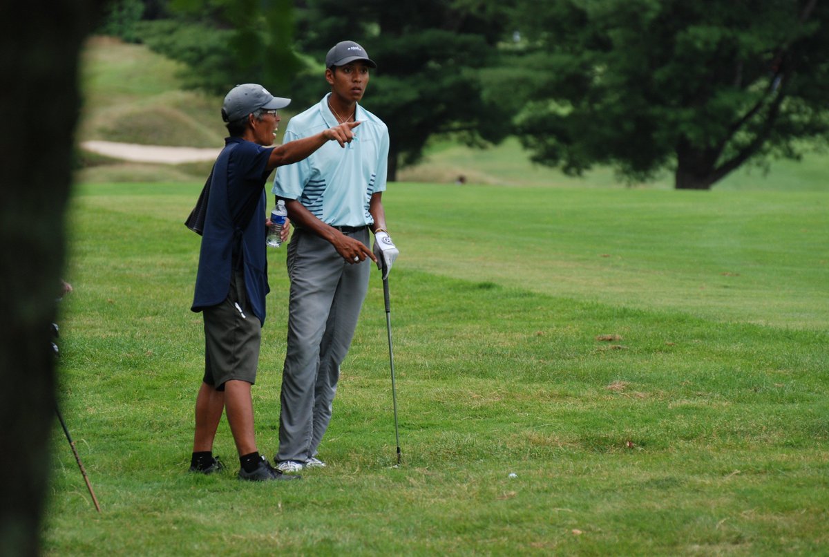 CSGALinks's tweet photo. Rasmey Kong went wire to wire at the 85th Connecticut Open, shooting 65-66-71-202 to win by a shot. With dad Soweth on the bag, the champion withstood a stern challenge from Paul Pastore to take the title, his first professional victory. https://t.co/aBUFwWegM7