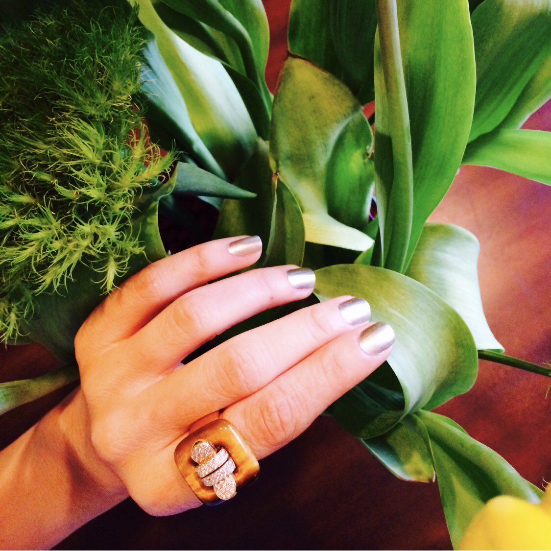 MichaelJJewelry's tweet photo. Tiger-eye stone has a beautiful natural shade of light brown and gold and is known to help you release fear and anxiety and aids harmony and balance. #tigereyering #chic #fashion #stylish #finejewelry #michaeljohnjewelry #daretobedifferent #nailpolish by #essie color: #goodasgold https://t.co/P8MSQsfuvF
