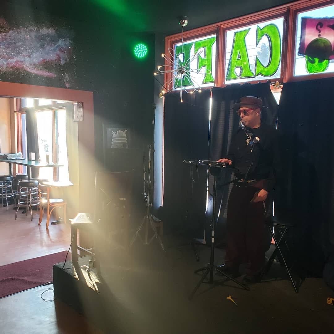 Vibes from a cool cat on a hot day! 🏙️🌞🎶 #OpenMicNightPDX