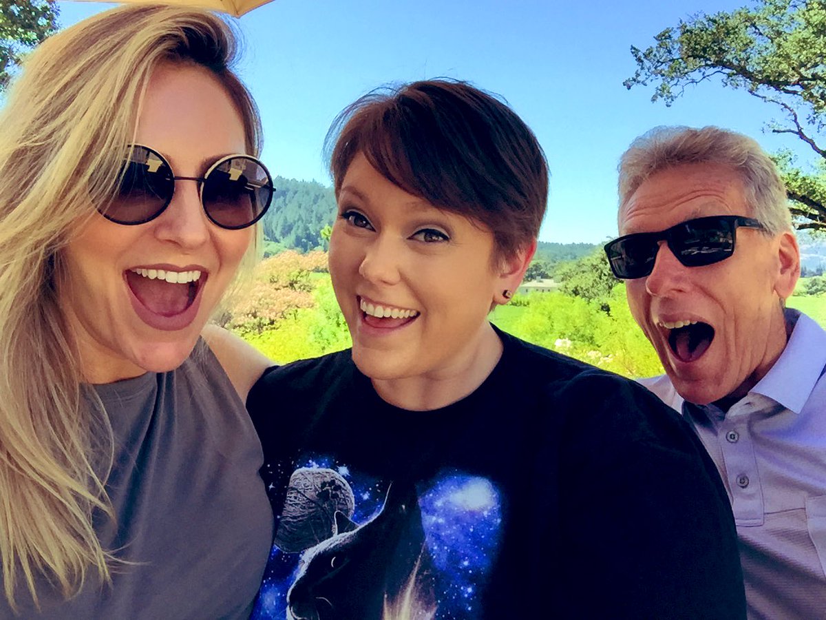 Pulling REALLY excited faces with the dad and sis