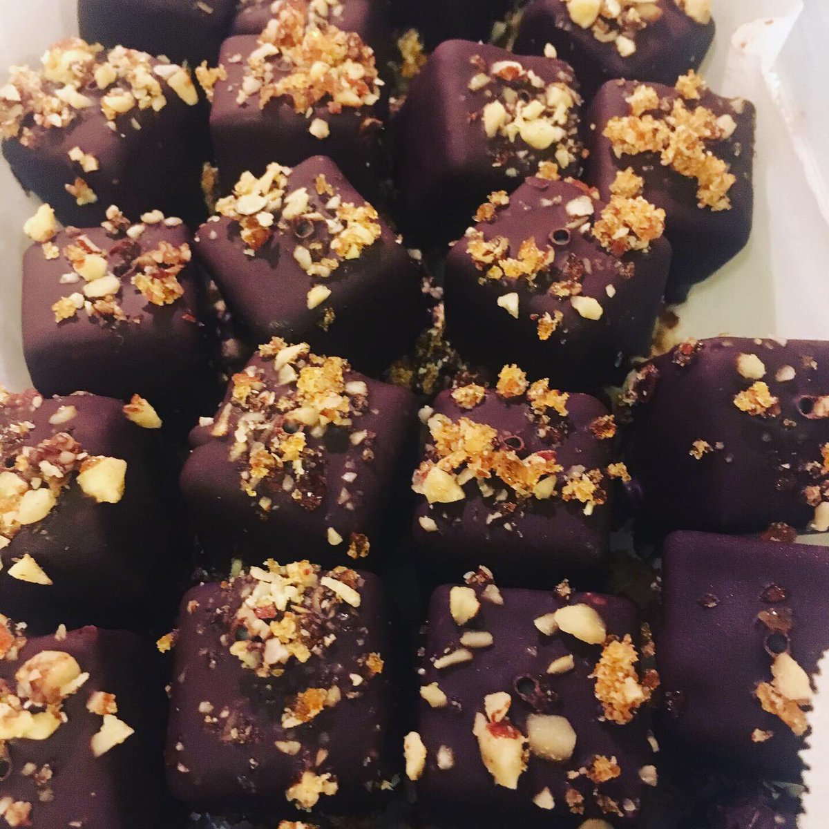 MorganStTheater's tweet photo. Coffee ice cream bonbons - coffee ice cream, bittersweet chocolate shell, salted hazelnut praline. #handmade #icecream #pdxeats https://t.co/zTQ8pw5xDp