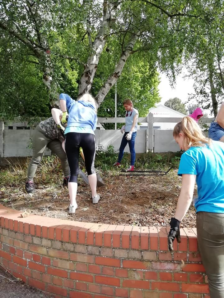The NCS students are working hard on our garden - good thing the sun's out! ☀️🌿#charity #students #lincoln #lincolnshire #gardening  #project