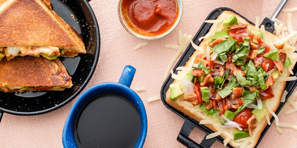 LeducCoopFood's tweet photo. : Campfire cooking is easy as (bush) pie. Don’t forget the bacon! 🥓 Find the recipe for Tomato, Avocado, Bacon, Mozzarella Bush Pie in Table magazine. 👨‍🍳: @chefdalemackay
.
.
Available now at your local Co-op Food Store. #coopcooks #coopfood #campfirecooking https://t.co/dWUy0R8vGW