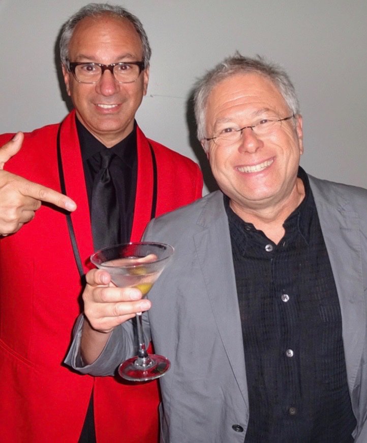 Mandating a martini-magnificent 70th to the menschiest musical master who ever melodized a mermaid, Mr. Menken. With love, friendship, and fathomless appreciation. <a href="/AIMenken/">Alan Menken</a>