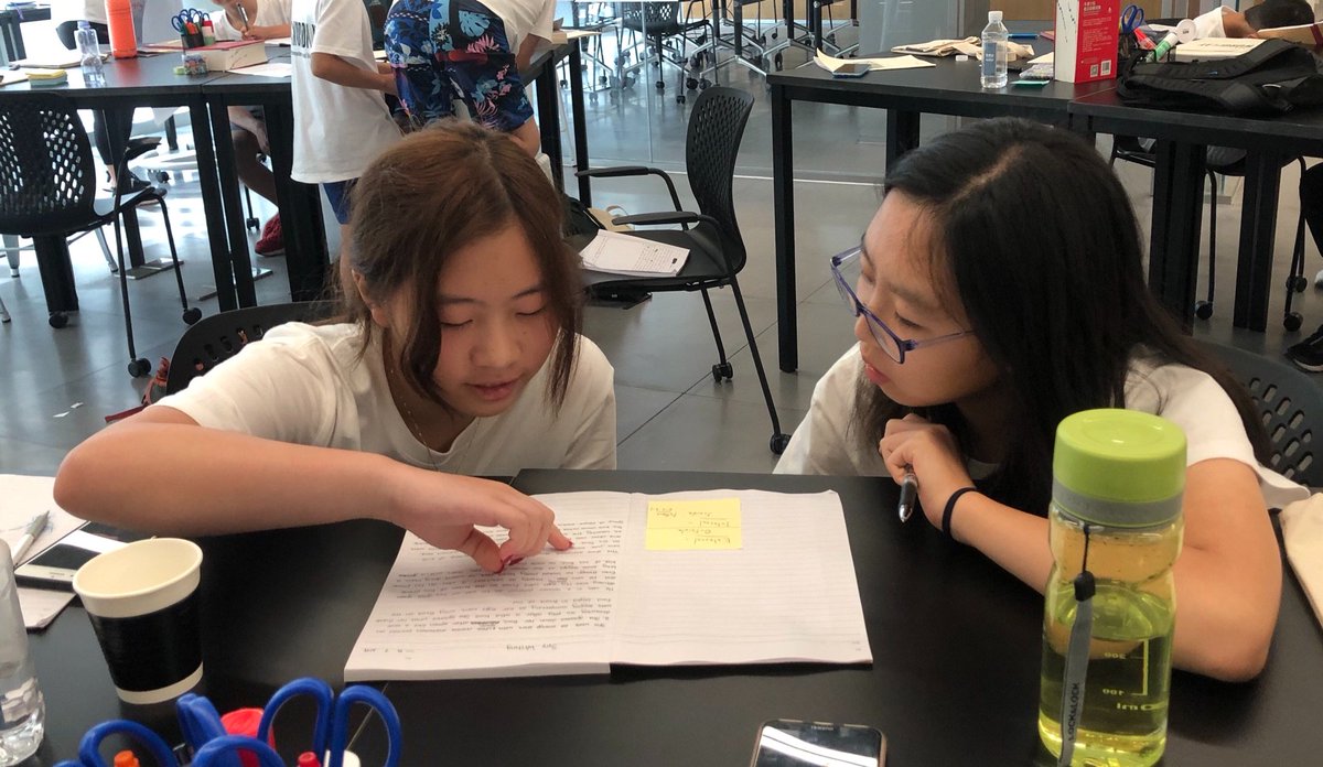 danfeigelson's tweet photo. Some serious peer conferring going on in our #MyWordPlay workshop, collaborating for two wonderful weeks with @kimberleyfung. The students from Shenzhen, (mainland) China 🇨🇳 are some of the most imaginative I’ve ever worked with! https://t.co/MIyPmmvyZi