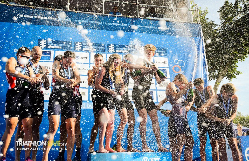 Nothing makes you feel better about a disappointing individual race other than a podium performance in the relay 🌟 Feeling thankful to be part of this fabulous team - love a post race champagne shower 🌟 📷- @triathlonlive