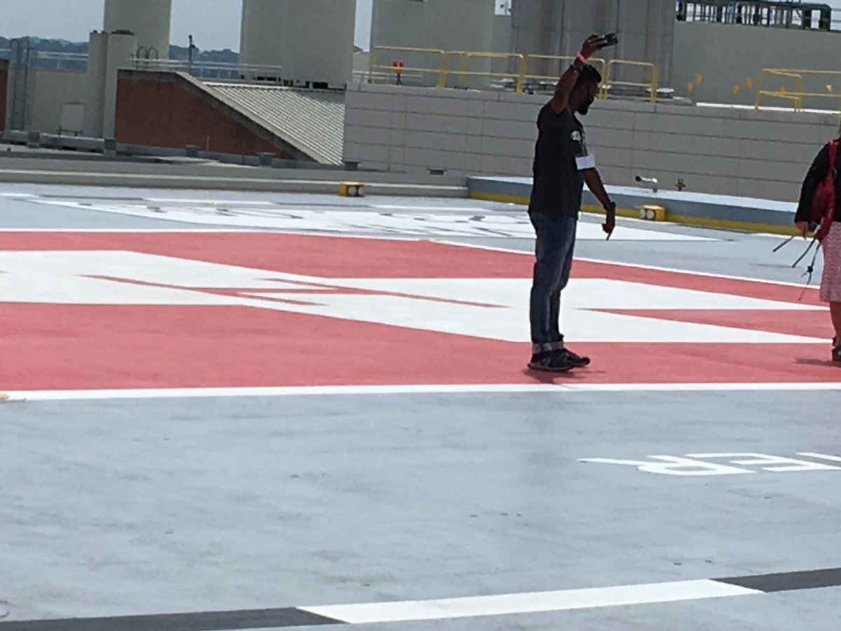 ExchangesWTCI's tweet image. Our delegation had a great time visiting @shocktrauma 
1. Mr. Sam Daniel, India impressed by the efficiency of bringing a patient to the @shocktrauma via #helicopter to acute care.
2. #Visitors from #Burma (left) and #India (right)checking out the helipad! 
@thegradschool