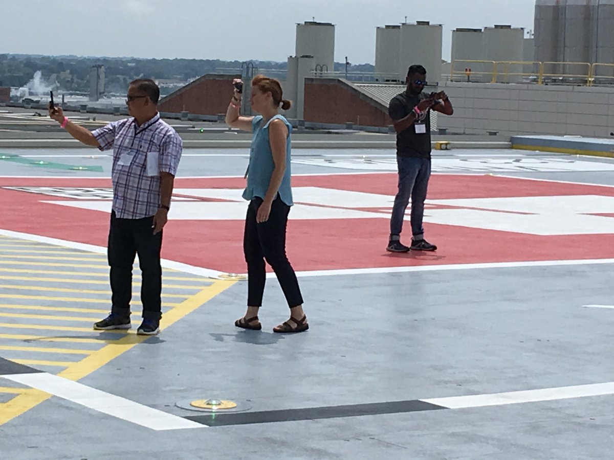 ExchangesWTCI's tweet image. Our delegation had a great time visiting @shocktrauma 
1. Mr. Sam Daniel, India impressed by the efficiency of bringing a patient to the @shocktrauma via #helicopter to acute care.
2. #Visitors from #Burma (left) and #India (right)checking out the helipad! 
@thegradschool