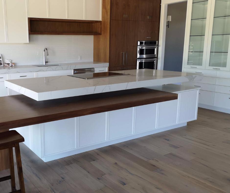 stonexgranite's tweet photo. We installed ST Quartz in Calcutta in this stunning @riverrockconstruction kitchen. It's a big statement in the space but it will also be a durable countertop that will be easy to clean for the home owner for years to come. #kitchencountertops #stone #design #kitchenisland https://t.co/br1HArCDz1