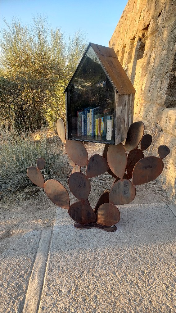 scottsdaleazgov's tweet photo. Check out Pinnacle Peak Park's new 'Books 2 Go' little library! Take a book, borrow a book or donate one! Structure is re-purposed from scrap used in other city projects, and it was carefully and beautifully crafted together by city employee Andrew Dorame. https://t.co/l9GM9Vu0uF