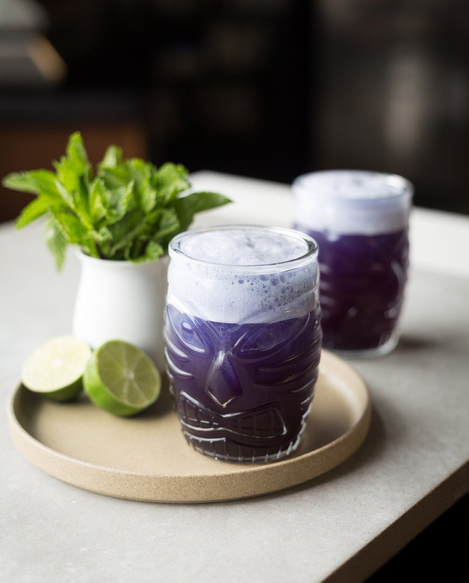 RishiTea's tweet photo. Get your summertime 'faux-jito' here. Our Deep Purple mocktail is the definition of alfresco refreshment: Moonlight Jasmine, spearmint syrup & fresh lime, shaken up with butterfly pea flower powder & topped with seltzer.
#rishitea #organictea #butterflypeaflower #teainfused https://t.co/uHa2hy3mm2