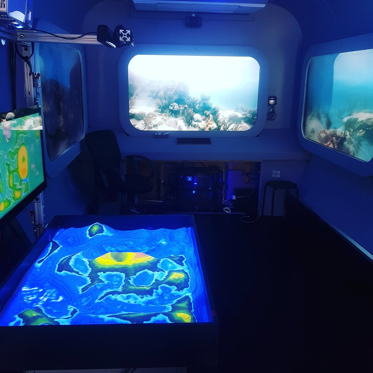 AR sandbox in action for teaching about benthic mapping in @ollieoceanlab at #NMEA19