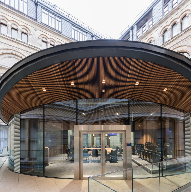 The Mayhew Theatre is a state-of-the-art learning facility for the Foreign and Commonwealth Office. IQ designed and installed the oval shaped #glassfaçade, complete with a solar control glass coating on the #curvedglazing > ow.ly/KJMk50v5YVA © Gordon Burniston