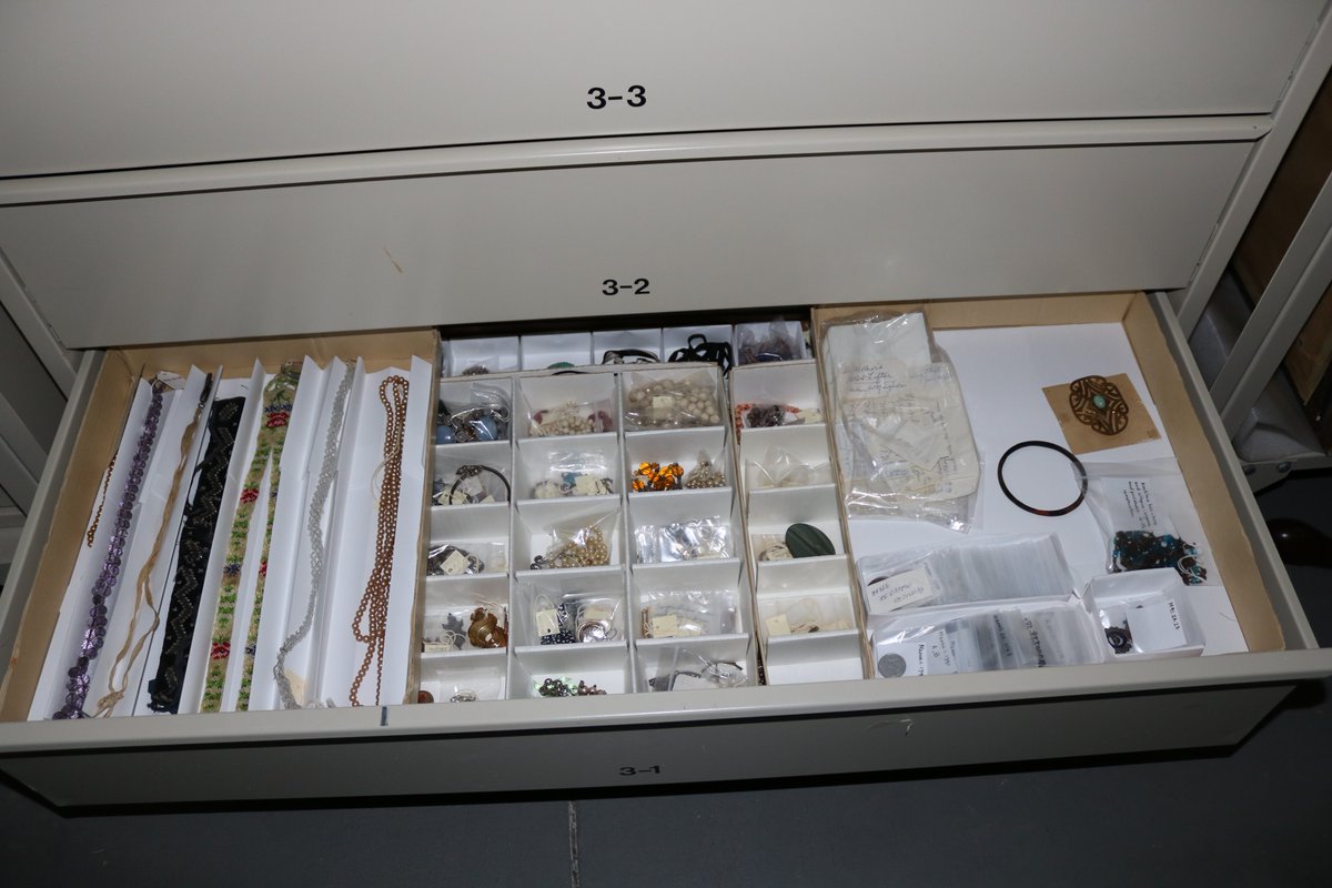 One of our lovely volunteers has a skill for rehousing.  Yes I have trained her to look for the right archival grade plastic and paper.  This is part of our jewelry collection.