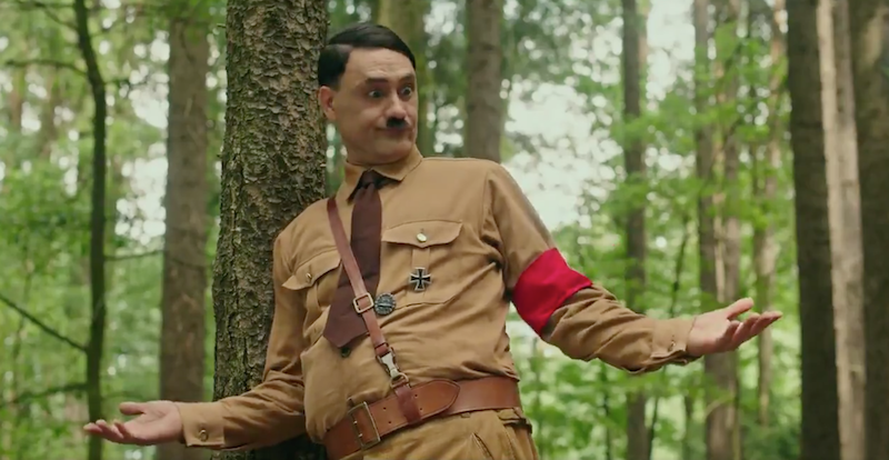 consequence's tweet photo. Watch Taika Waititi play an imaginary Adolph Hitler in the first teaser for new "anti-hate satire" Jojo Rabbit: https://t.co/28c2aOVqRH #JoJoRabbit #visionistical https://t.co/Fc76EsATjz