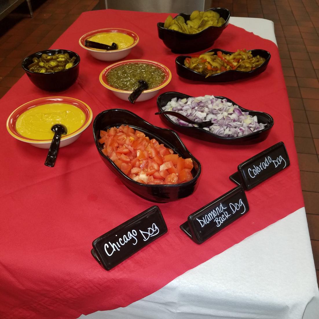 brockcoinc's tweet photo. Celebrate #NationalHotDogDay right with some colorful condiments! Try mixing up this traditional lunch food with a #ChicagoStyleDog including yellow mustard, white onions, pickles, relish, and tomato like we did at @MassanuttenAcad!
.
.
.
#foodservice #boardingschool https://t.co/93KHuyHVQv