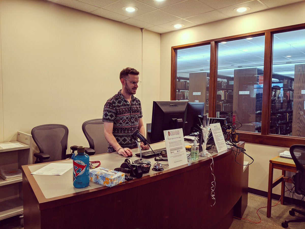 UWMadArchives's tweet photo. We are rockin' n' rollin' with our new service desk! Our student, Tyler, says it's a vast improvement...we'll go with that. Come visit us, we're here to help with your research needs. #archives #uwmadison #steenbocklibrary #furnitureupgrade #archivesspaces https://t.co/2W9i0EGyle