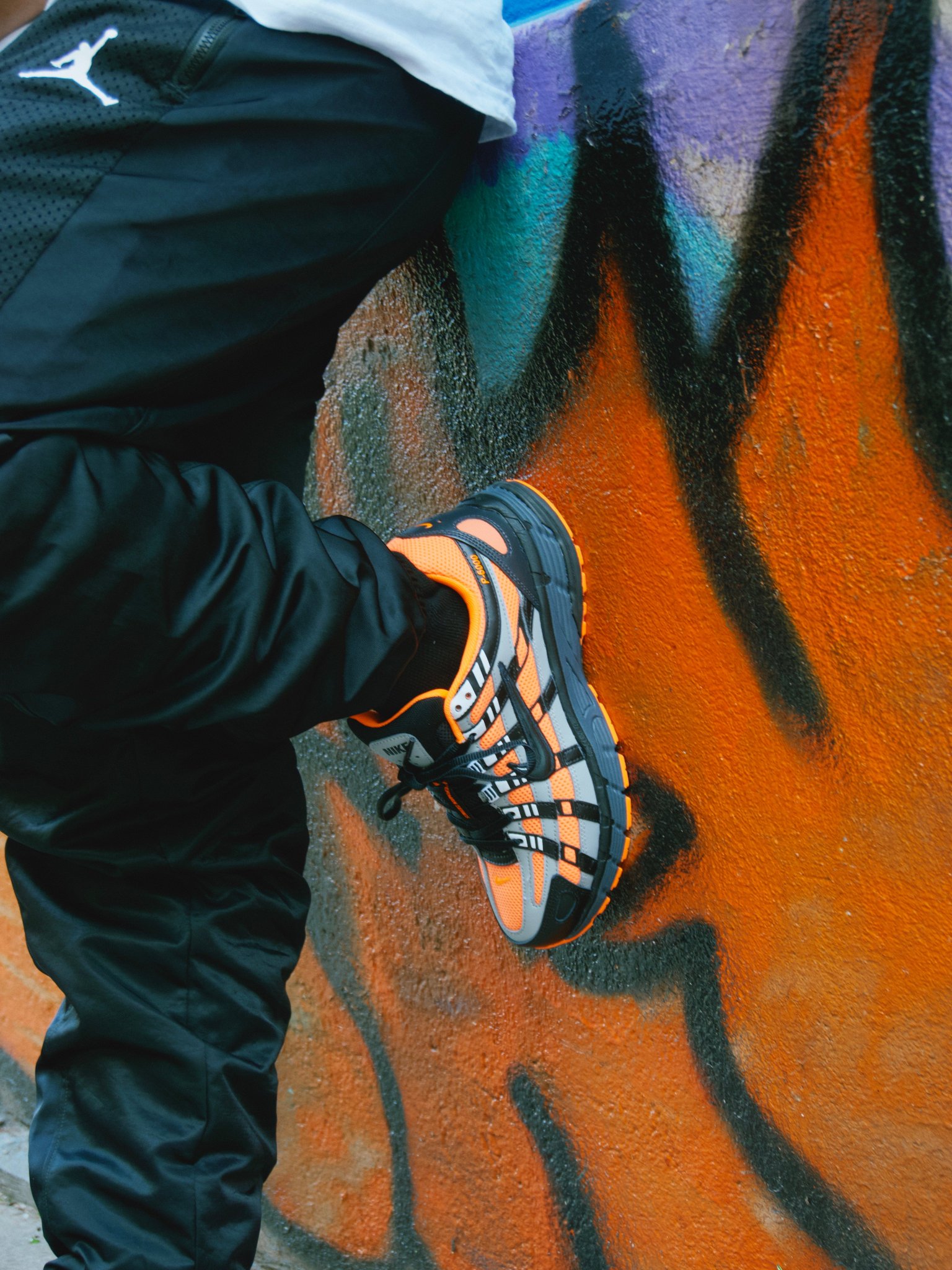 nike p6000 black orange