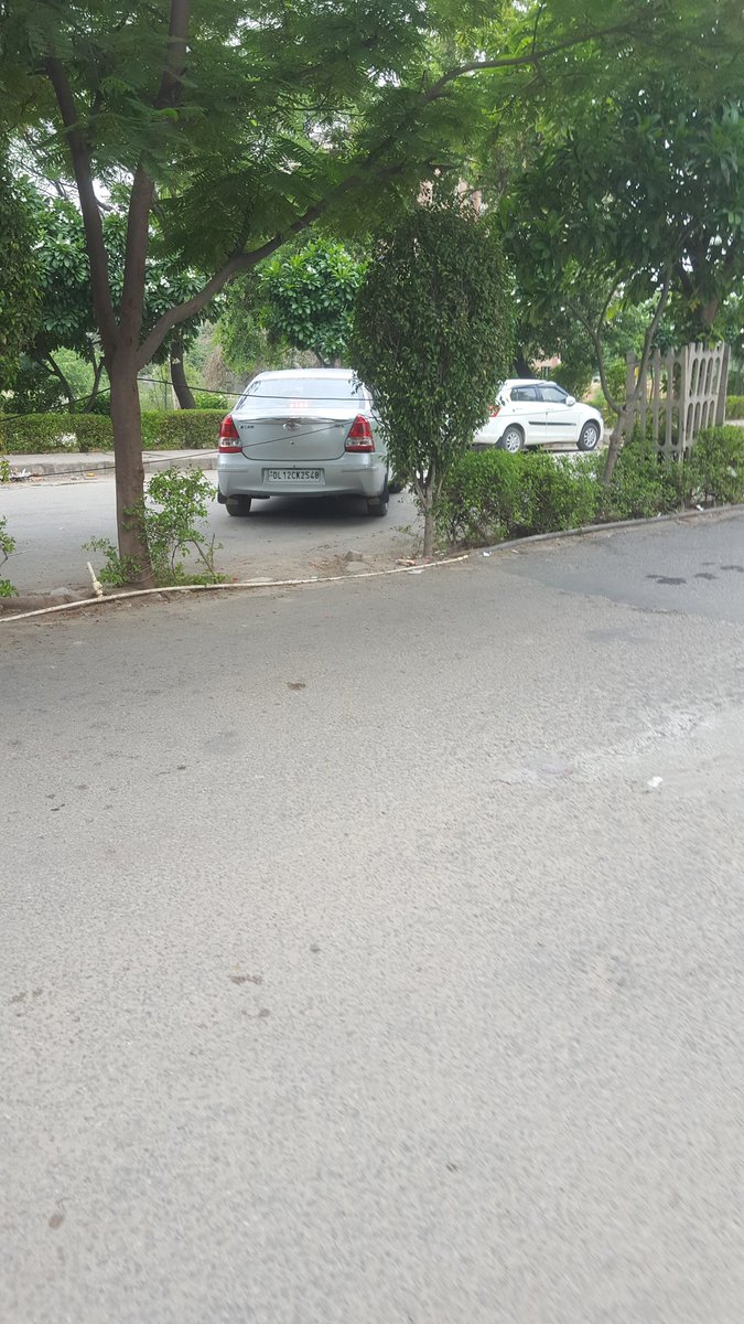 Sandeep_7488's tweet photo. @DCPDwarka Public drinking in parking of Pinnacle mall. Car pic attached in which they left. Please take action https://t.co/0FJIGpWTzH
