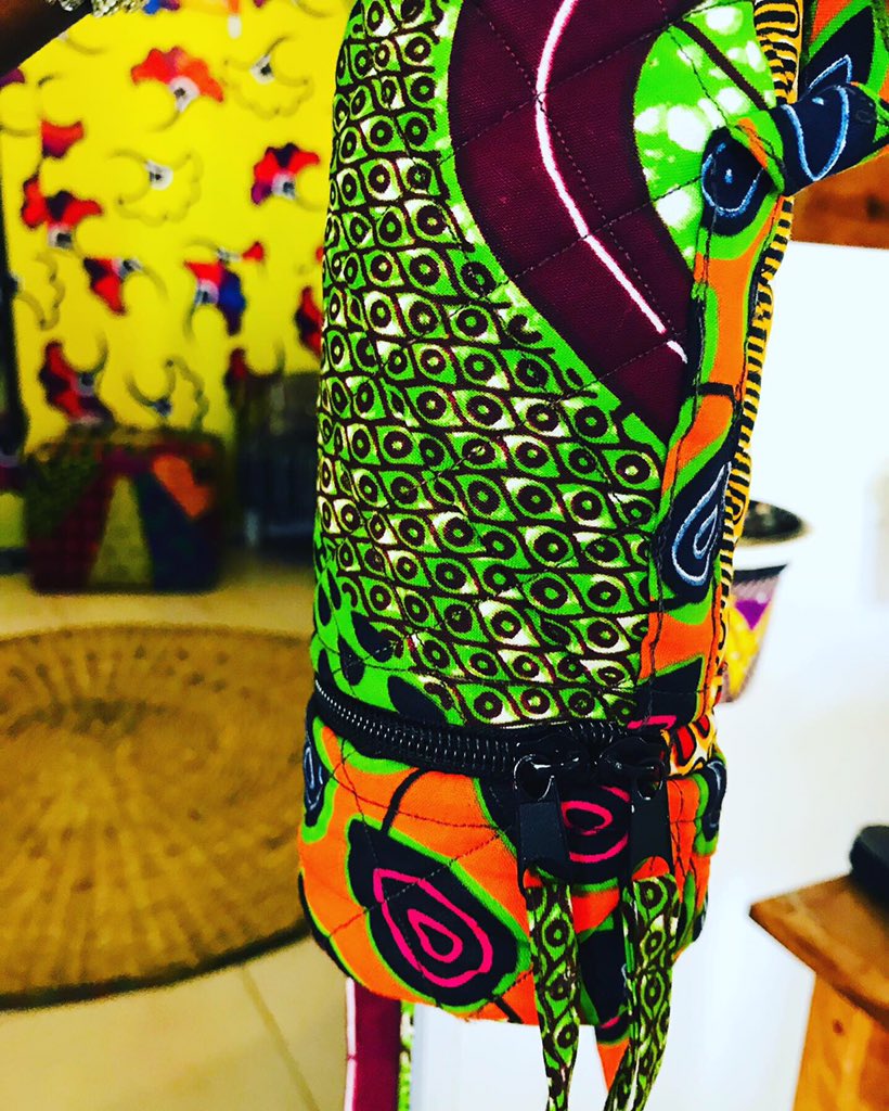 TIGAGambia's tweet photo. This handmade water bottle holder is custom made for one of our fav customers. It’s sustainable, reusable and it’s cheeky design is fun and fabulously vibrant. We love it!! #madetoorder #Tiga #madeinafrica #madeingambia🇬🇲 #handmade #custommade #bottlecase #wax #weleadothersfollow https://t.co/RKiYvfyzH4