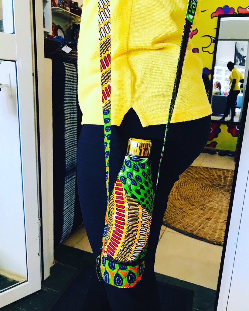 TIGAGambia's tweet photo. This handmade water bottle holder is custom made for one of our fav customers. It’s sustainable, reusable and it’s cheeky design is fun and fabulously vibrant. We love it!! #madetoorder #Tiga #madeinafrica #madeingambia🇬🇲 #handmade #custommade #bottlecase #wax #weleadothersfollow https://t.co/RKiYvfyzH4