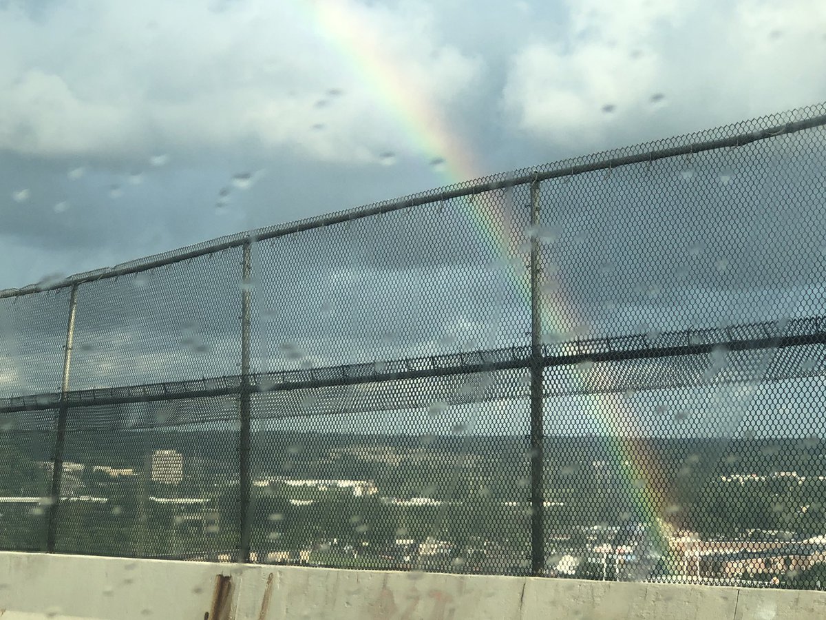 mh44137's tweet photo. Saw the beginning or end of the rainbow this morning on the Valley View bridge. Thankful traffic stopped to look.  You can see the reflection of the rainbow on the buildings below. https://t.co/RlMEm0oxj3
