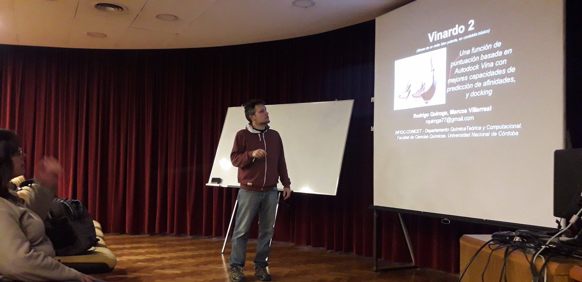 workshopTPC's tweet photo. Ahora Rodrigo Quiroga ( INFIQC-CONICET y FCQ-UNC.) nos cuenta sobre "Acoplamiento molecular (Vinardo). Dónde la físico-quimica y C++ se encuentran". 
#charlasinvitadas
@funsadosky @ThePSF @unq @facetuntoficial @fcqoficial @PabloAlcain @ceciliajarne @rlugones23 @GachiMolina https://t.co/f3soiZ82h9