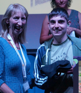 TheMilestoneSch's tweet photo. To rapturous applause #Kyle & #Joey receive #photos #scrolls and their #Leavers2019 t-shirts from #LynDance #HeadTeacher for all their time @TheMilestoneSch https://t.co/zu53b5JxP0
