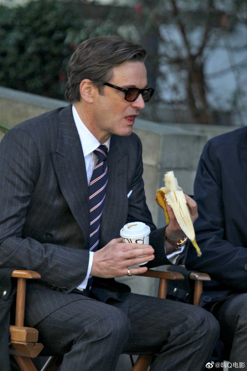 elessarule's tweet photo. colin firth eating a banana and then staring disappointedly at it https://t.co/a8GxNtWH5q