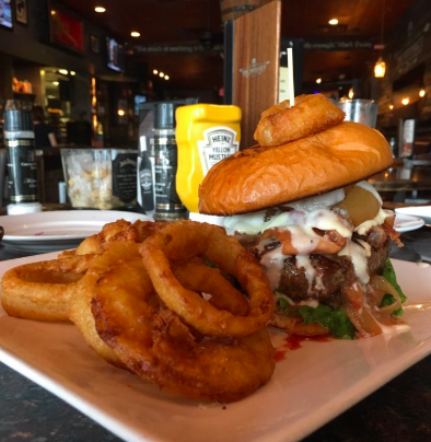 Onion Rings &amp; The Salty Pear Burger (photo: Cesar) #downatthewhiskey #orlandoeats #burger #burgers #treatyoself #buzzfeast #bestburgers #foodoftheday #foodiegram #orlandorestaurants