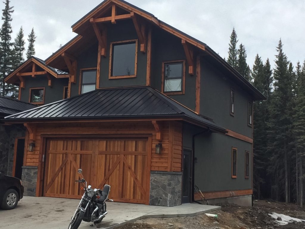GoldenTrowelYYC's tweet photo. We love a bold colour choice like black or dark grey on exteriors. Especially when paired with wood accents and a motorcycle 🏍️ https://t.co/bsol1Zmqrw
