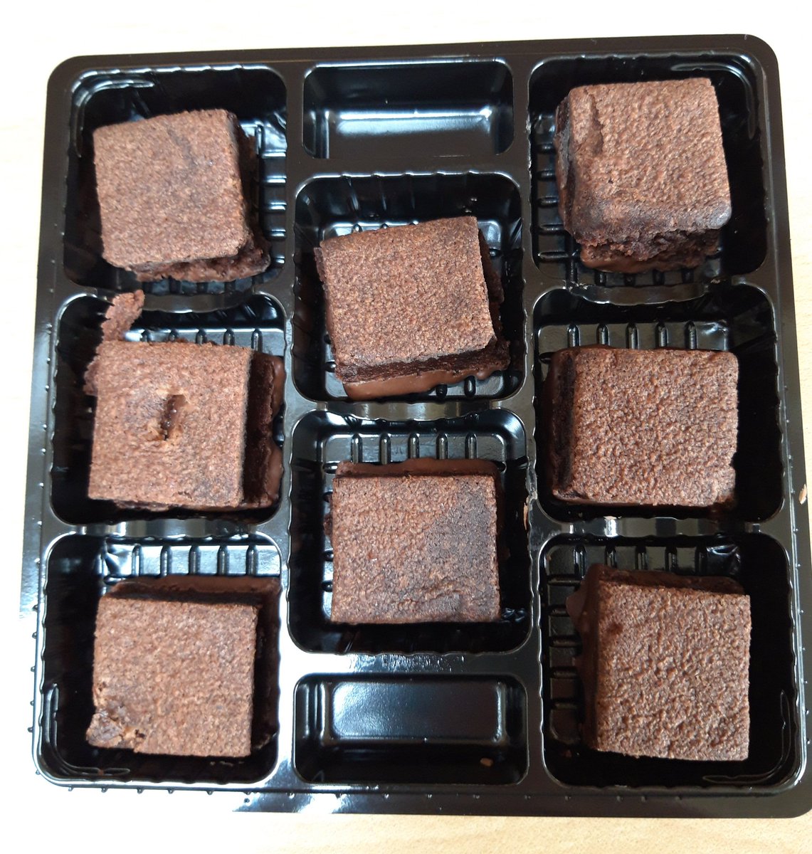 Thorntons...You robbers !
For this simple package redesign,for every 8 packets you make you have another packet in production for nowt...Multiply that by the millions you produce and that's a LOT of profit !!
YOU HAVE ROBBED ME OF ONE OF MY 9 BROWNIE SQUARES !!!