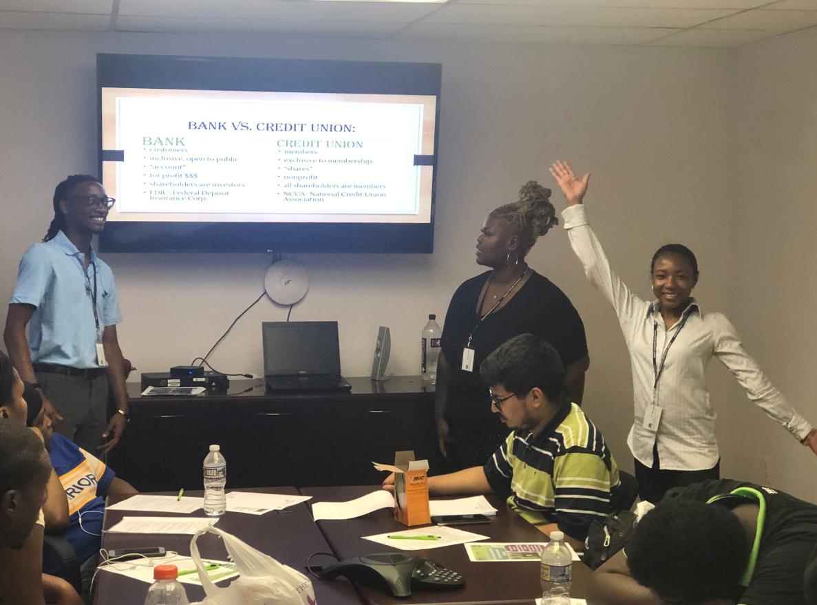 BankonDC's tweet photo. @cmoneymoguls @CFEfund Experience is the greatest teacher! Here we have team @mcmofficial04 presenting to a group of youth about the difference between a bank and credit union. #summerjobsconnect #facesofthe40 #mbsyep19 #ymm19 https://t.co/dmyvwQEQl4