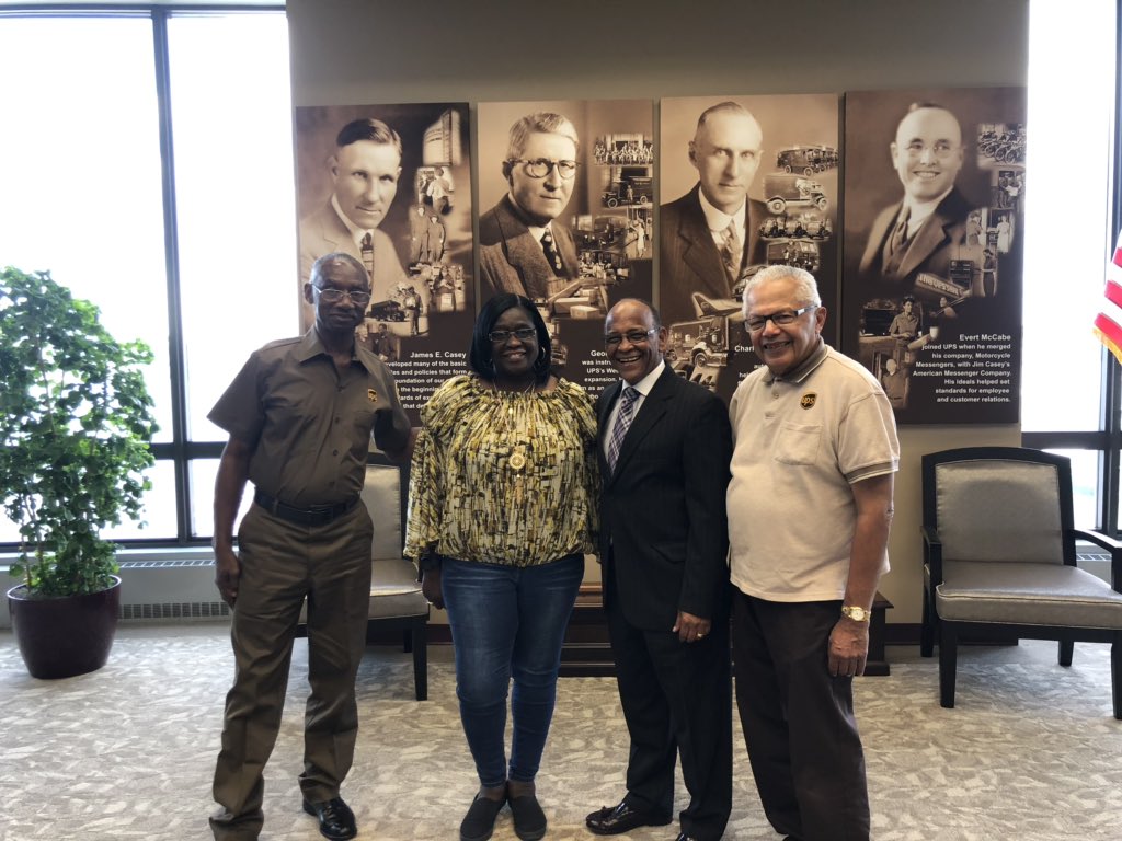 Left to right UPSers William Brown 48 yrs Service Provider, Vanessa Scott Executive Assistant 41 years, Noel Massie (me) 42 years, William Crosby Customer Center Associate 55 years! And 80 years old! 186 years of UPS Service pictured, What a privilege to stand with them!
