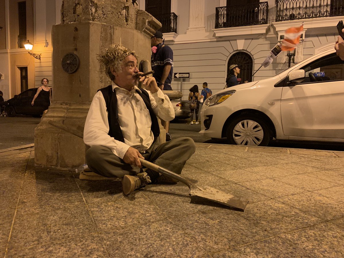jesscunnington's tweet image. This man is singing that he’s already dug a hole for Rosselló — everyone waiting for his address #RickyRenucia