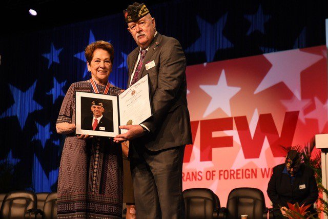POWMIAFamilies1's tweet photo. ICYMI: Ann Mills-Griffiths, Chairman of the Board of the National League of POW/MIA Families, received the VFW Americanism Award at the 120th #VFWConvention @AnnMillsGriffit via @VFWHQ https://t.co/mtuqU3u5Zm https://t.co/iBwNFmaFiH