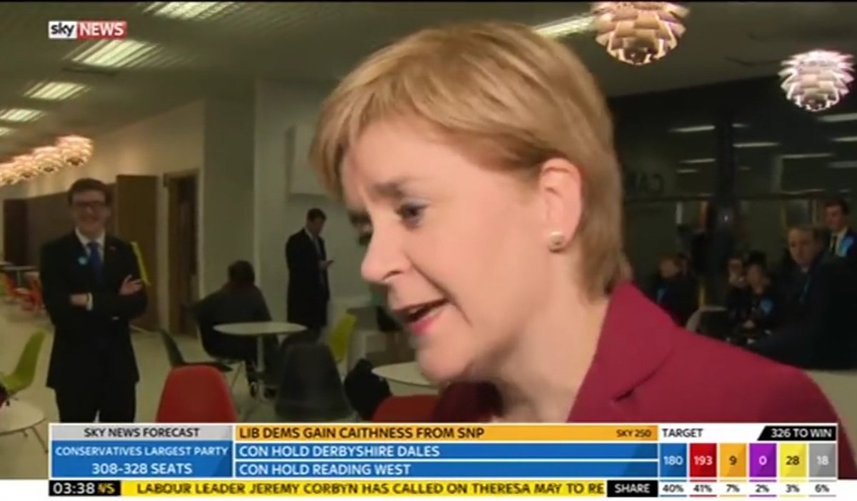 indy_swim's tweet photo. Bet you that the smug Tory in the background on the left of @NicolaSturgeon is now full of worry considering the Tories will no doubt be annihilated at the next election in Scotland #TeamRuth #TeamRuthIsDead @Conservatives @ScotTories #SNPGain #ByeByeTories #2017Reversed https://t.co/x06YlUYGqY
