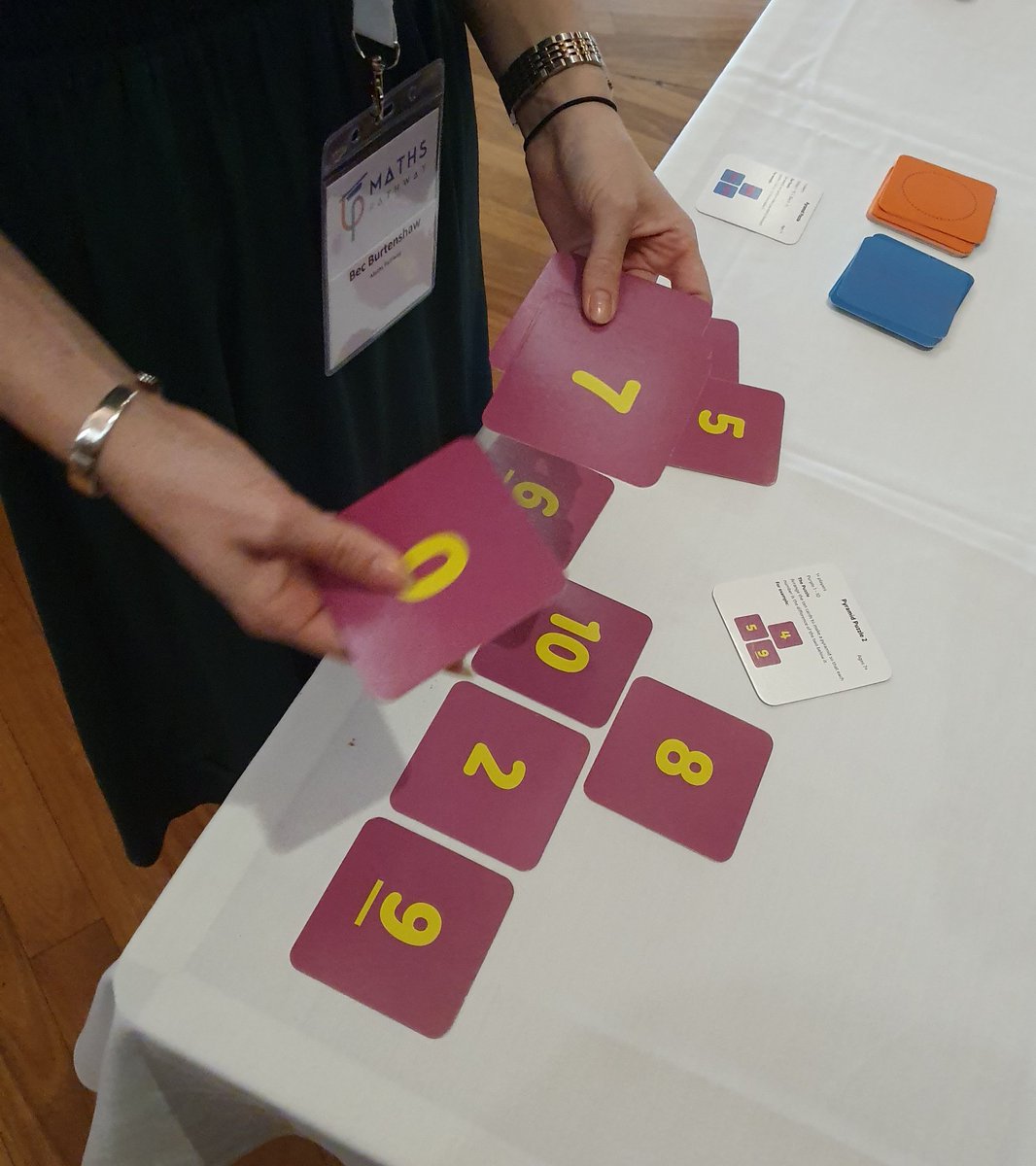 HumanEd_Au's tweet photo. Lots of productive puzzling going on at the @MathsPathway #PATH2019 puzzle table. Adults are loving pattern block triangles and Tiny Polka Dot from @MathforLove https://t.co/6kDYe3FEmw