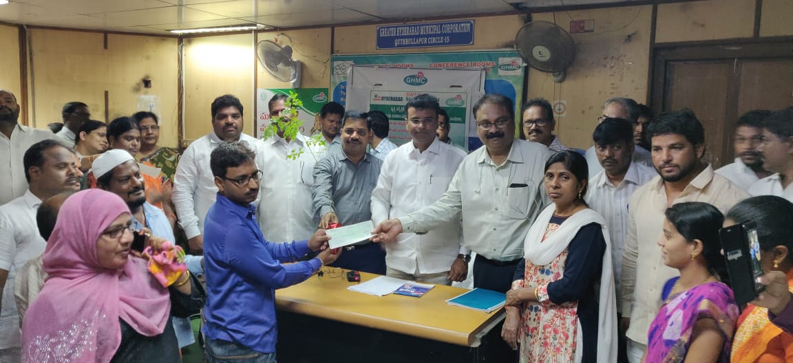 Distribution of Bins, Honorarium to RPs, VLR and Cheques to Minorities by Hon' MLA Quthbullapur AC and ZC KPZ.