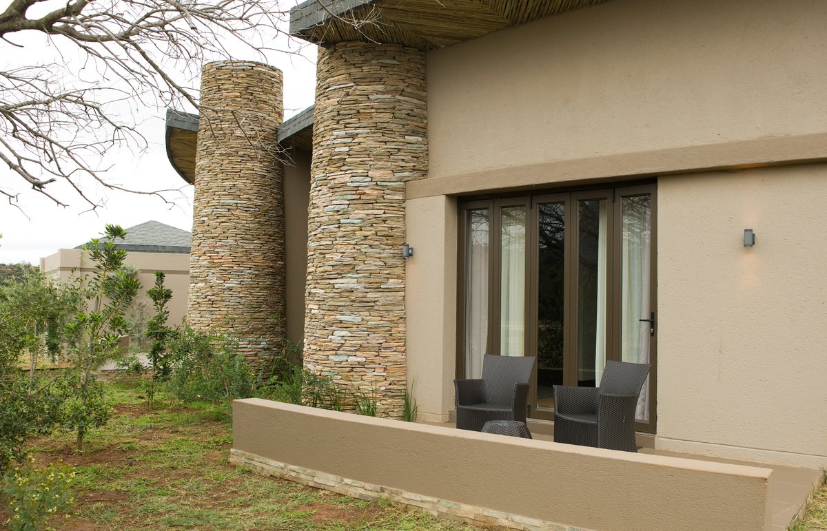 Legend Golf Safari Resort suites are built in the bush where there are no fences or gardens, 200 rooms, built across the bush within the resort.

The suites, consisting of four or five individual bedrooms linked by walkways, offer accommodation of unmatched, timeless elegance