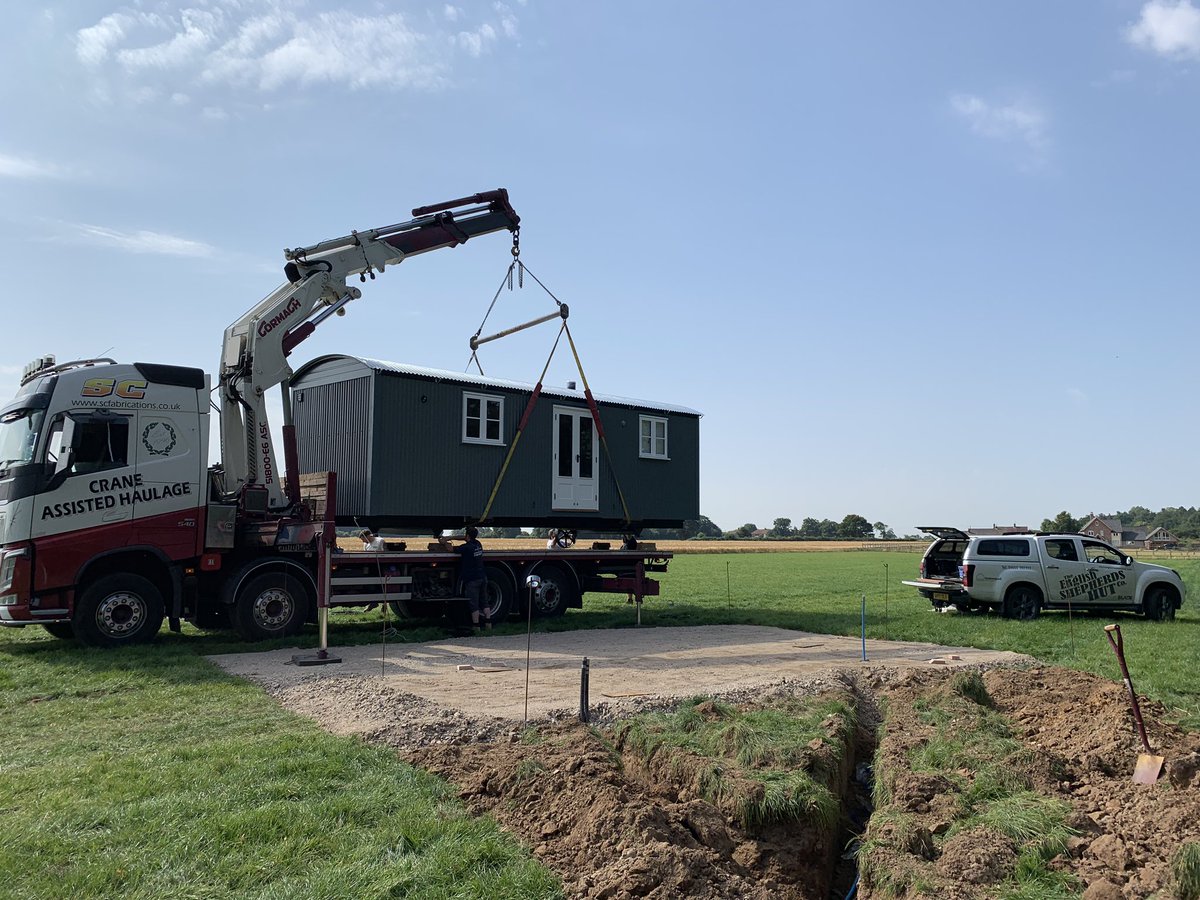 BerryHallFarm's tweet photo. Wow we have landed! First hut in place The  Farmhouse Hut at Berry Hall Farm Retreat. Busy busy getting the groundwork ready for our first visitors in August. What an amazing view you will have! #Glamping #Norfolk #glampingatitsfinest #glampinglife #norfolkbroads #relaxation https://t.co/CyUN4G6Qph