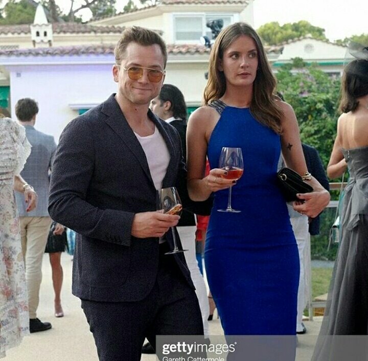 Jaredproudofyou's tweet photo. @TaronEgerton with his girlfriend Emily Thomas @ejaf #midsummerparty #Antibes #France 24/07/2019 https://t.co/5mKrm0ZrL2