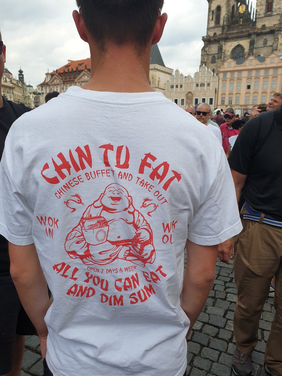 Told him to stop so I can take a pic. I love the wordplay on that shirt.  #WokInWokOut  #AllYouCanEatAndDimSum Hahaha!  #OldTownSquare  #Prague  #Travel