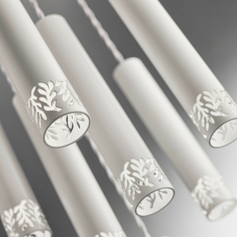 This beautiful white range has been made from steel with laser cut leaf shapes adding detail and interesting - taking this light a cut above the rest kolarz-uk.com