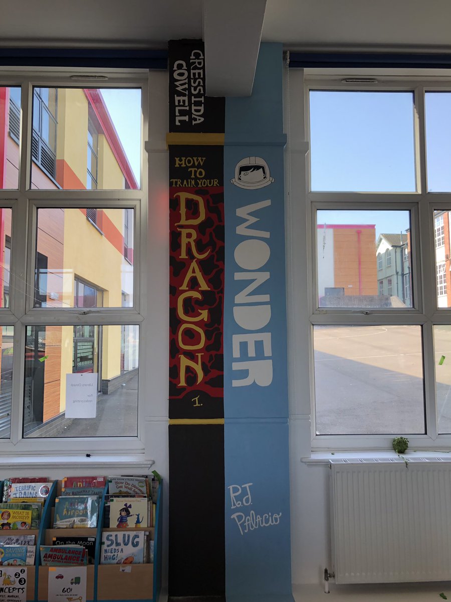 AmesCharley's tweet photo. #howtotrainyourdragon and #wonder  #librarymakeover #books #painter #decorator #library #school https://t.co/2wSMMFXTRQ