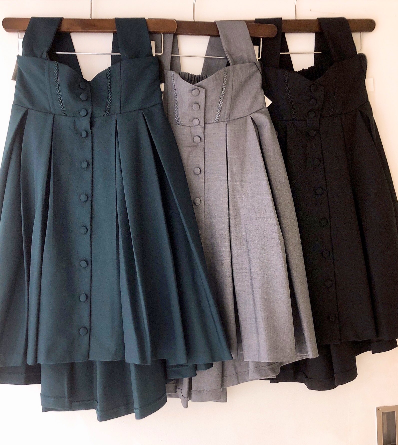 Sheglit スプレッドタックスカート ダークグリーン